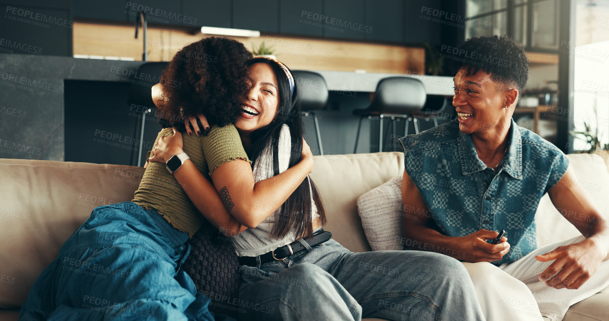 Buy stock photo Women, excited and hug in living room for reunion, friends and happiness in embrace as thank you. Female people, man and smile in apartment or home as welcome, relax and cheerful on sofa as surprise