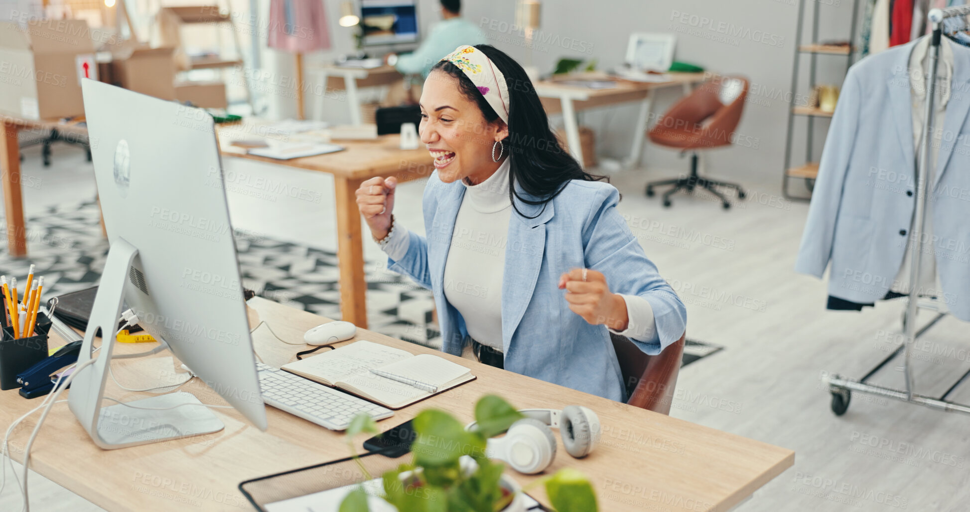 Buy stock photo Small business, woman and fist on computer as fashion designer for good news and loan approval. Female person, entrepreneur and excited or happy for email notification at office for workshop funding