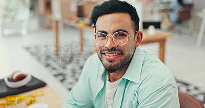 Buy stock photo Creative, glasses and portrait of fashion designer man in textile workshop for production. Clothing, confident and small business with happy style director at desk in office for manufacturing process