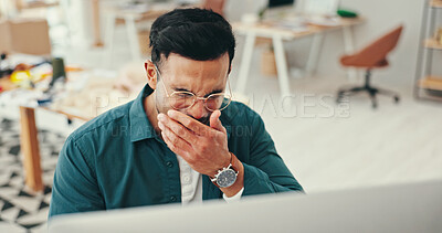 Buy stock photo Man, fashion designer and yawn or tired on computer at workshop with overtime and project deadline. Male person, employee and exhausted or burnout with research for creative ideas and logistics