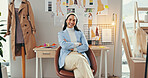 Arms crossed, confident and portrait of fashion designer woman in textile workshop for production. Clothes, creative and wall with happy style director at desk in office for manufacturing process