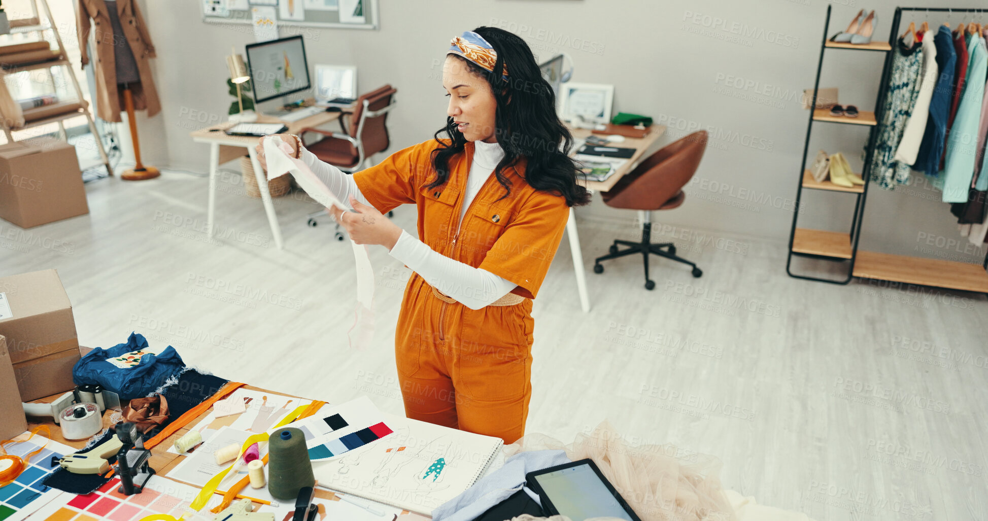 Buy stock photo Decision, creative and fabric with fashion designer woman in textile workshop for material choice. Clothing industry, table and texture with style director in office for manufacturing or production