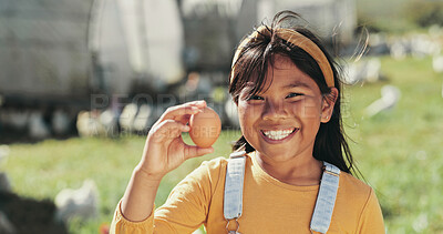 Buy stock photo Girl, child and egg at chicken farm for portrait, smile and outdoor with learning in countryside. Kid, happy and excited on field with poultry, birds and food at free range agriculture in Malaysia