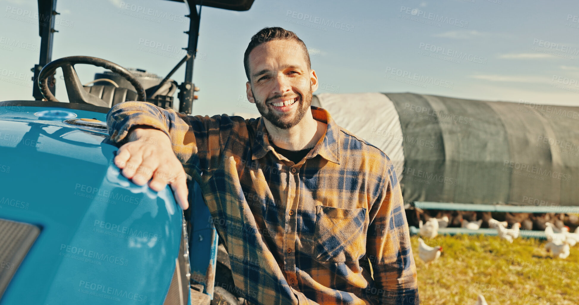 Buy stock photo Man, farmer and smile in portrait by tractor, outdoor and free range chicken on field in summer. Person, happy and vehicle for agriculture at sustainable poultry farm with sunshine in Costa Rica