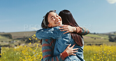 Buy stock photo Friends, women and happy with hugging in countryside for travel adventure, reunion and bonding at rapeseed farm. Weekend trip, people and embrace in field for surprise connection and excited together