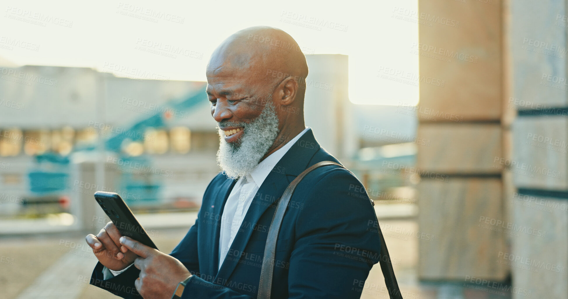 Buy stock photo Black man, city lawyer and phone for journey, agenda and online for consulting on legal case. Mature person, urban town and travel to office building for justice, counsel client and message on app