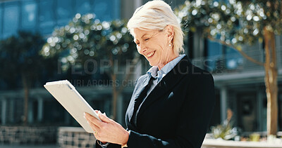 Buy stock photo Tablet, communication and mature businesswoman in city for email, connectivity or networking. Digital technology, research and female executive CEO with online contact for corporate deal in town.