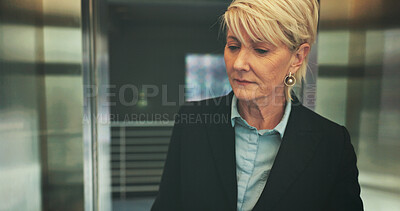 Buy stock photo Business, woman and thinking in office elevator for morning commute, journey to work or daydreaming. Mature professional, person or thoughtful in lift for corporate travel or leaving company building