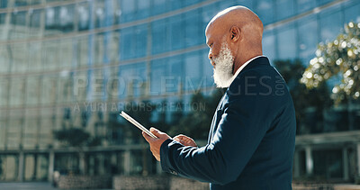 Buy stock photo Tablet, communication and mature businessman in city for email, connectivity or networking. Digital technology, research and African male executive CEO with online contact for corporate deal in town.