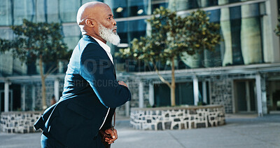 Buy stock photo Late, business man and walking in city for urgent meeting, rushing to appointment or moving fast. Mature professional, black person and speed on morning commute, hurry for deadline or time management