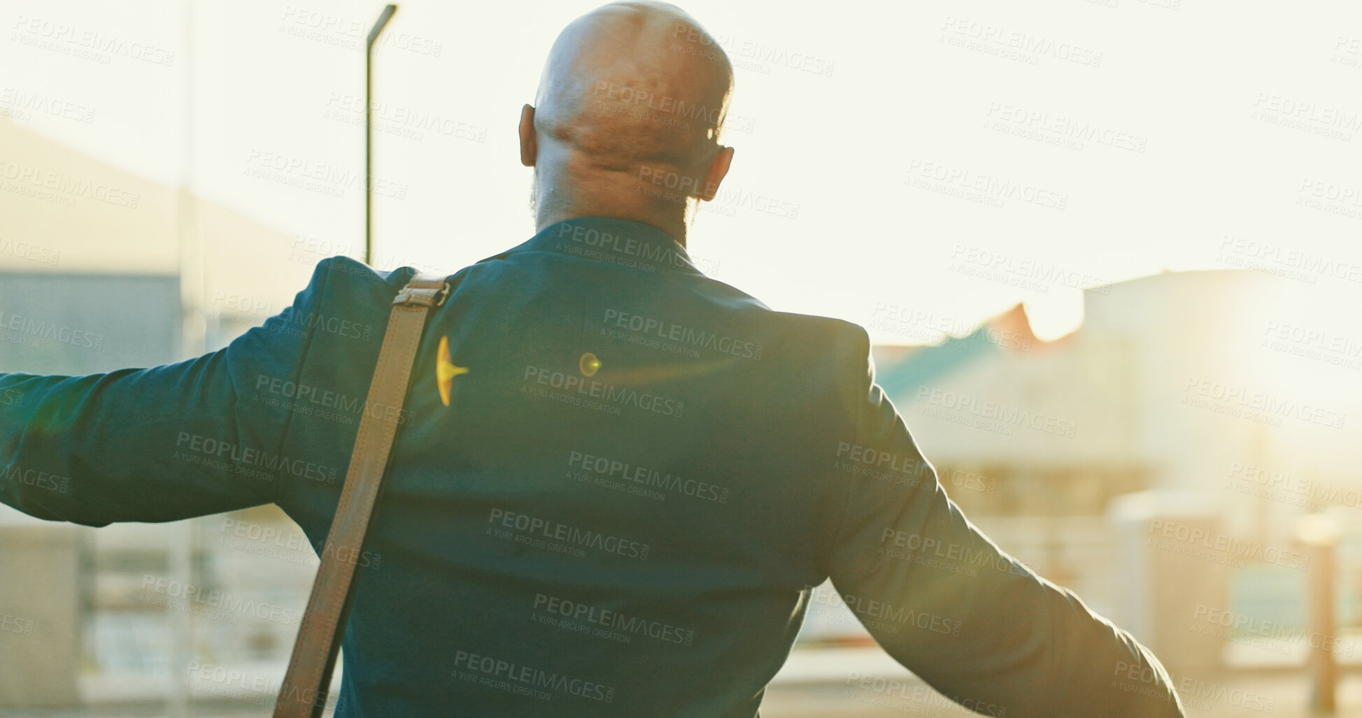 Buy stock photo Back, business man and celebration in city for success, investment profit and win lottery. African worker, cheers and victory outdoor, good news and dance for goal achievement or promotion at sunset