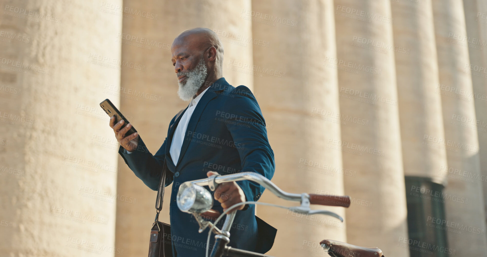 Buy stock photo Bike, phone and search with business black man outdoor in city for communication or commute. Building, directions on mobile app or text message and mature employee with green transport for cycling