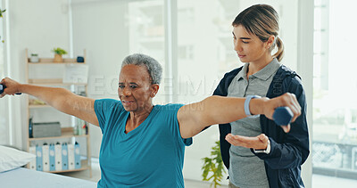 Buy stock photo Senior woman, physiotherapist and dumbbells for recovery from injury with guide, help and support. People, wellness and exercise for muscle, rehabilitation and progress with weightlifting at clinic
