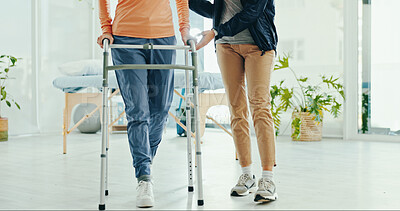 Buy stock photo Legs, physiotherapy and walker for patient, help and support for recovery, steps or guide at hospital. Doctor, frame and person with disability for rehabilitation, balance and feet at wellness clinic