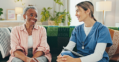 Buy stock photo Senior woman, caregiver and tablet with advice for healthcare, comfort and treatment in elderly care at home. People, nurse and symptom checklist for help, conversation and checkup in retirement