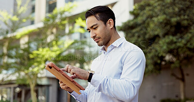 Buy stock photo Tablet, reading and Asian businessman in street for news, corporate email and outdoor travel. Professional, check and city planner with touchscreen for networking, online update and urban development