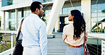 Outdoor, business people and walking to office with conversation, networking or commuting in city. Back view, employee and coworkers with talking or ready to start work in urban town as professionals