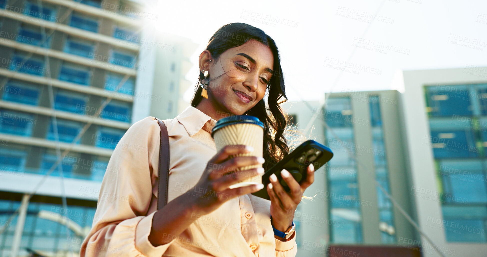 Buy stock photo Happy, business woman and browsing with phone in city for social media, communication or reading news. Low angle, female person or employee with drink or mobile smartphone for online chatting or app