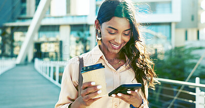 Buy stock photo Phone, coffee and reading with business woman in city for communication, corporate email and travel. Networking, contact and smile with person on bridge for professional, online news and text