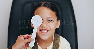 Buy stock photo Hand, cover or child in eye test at optometry clinic for eyewear, treatment or sight wellness. Portrait, occluder or happy girl kid in assessment for optical diagnosis, vision exam and consultation