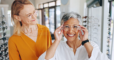 Buy stock photo Glasses, frame and consulting with people in store for eye care, healthcare and optometry. Shopping, lens check and choice with customer in clinic for ophthalmologist, vision and prescription help