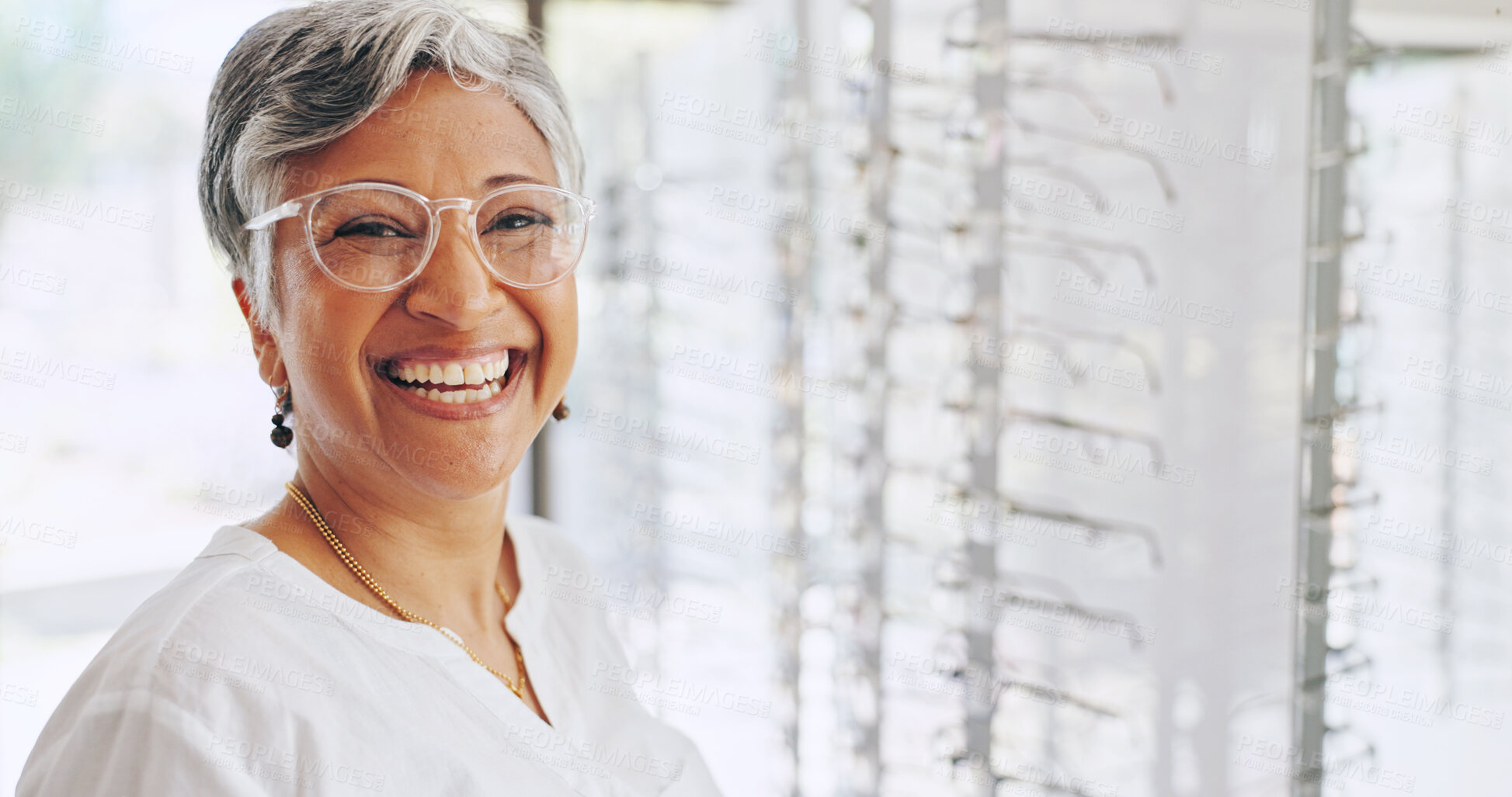 Buy stock photo Glasses, portrait and smile with woman in store for eye care, healthcare and optometry. Shopping, lens check and frame with mature customer in clinic for ophthalmologist, vision and prescription
