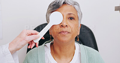 Buy stock photo Doctor, optometry and portrait of woman in exam for eye care, hands and senior person with occluder in clinic. Ophthalmologist, face and patient with tools for vision check, cover or test for health