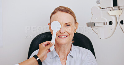 Buy stock photo Hands, optometry and portrait of woman in eye exam for healthcare, smile and mature person with occluder in clinic. Ophthalmologist, face and patient in test for vision check, cover or correction