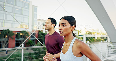 Buy stock photo Interracial couple, runner and fitness in city for workout, exercise or training together in urban town. Man, woman and athlete with cardio, sports or marathon for endurance and health or wellness