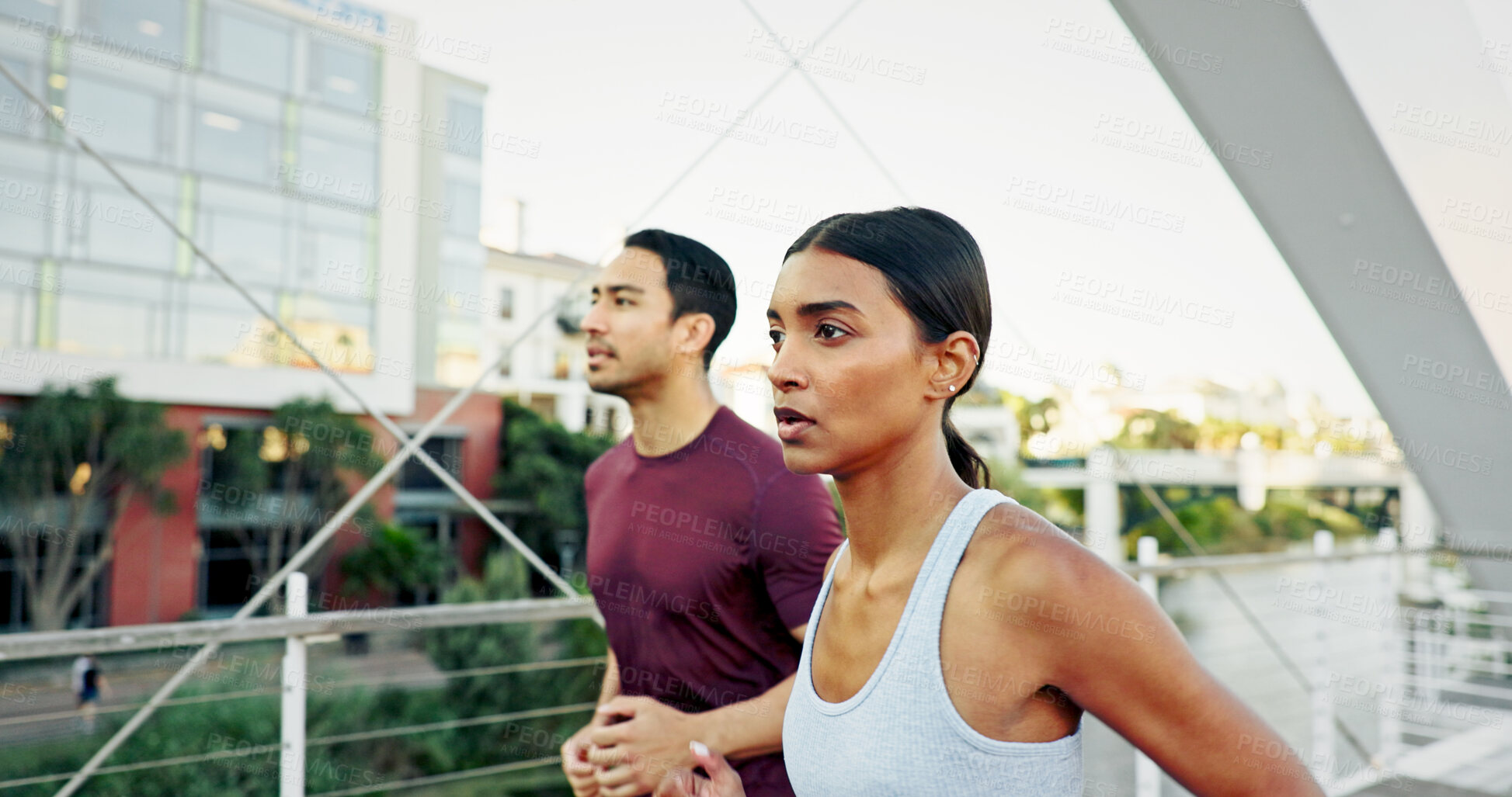 Buy stock photo Interracial couple, runner and fitness in city for workout, exercise or training together in urban town. Man, woman and athlete with cardio, sports or marathon for endurance and health or wellness