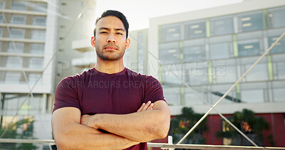 Buy stock photo Portrait, fitness and man in city, arms crossed and urban town with buildings, sports and exercise. Serious face, healthy athlete or person in street, training and wellness with workout and pride