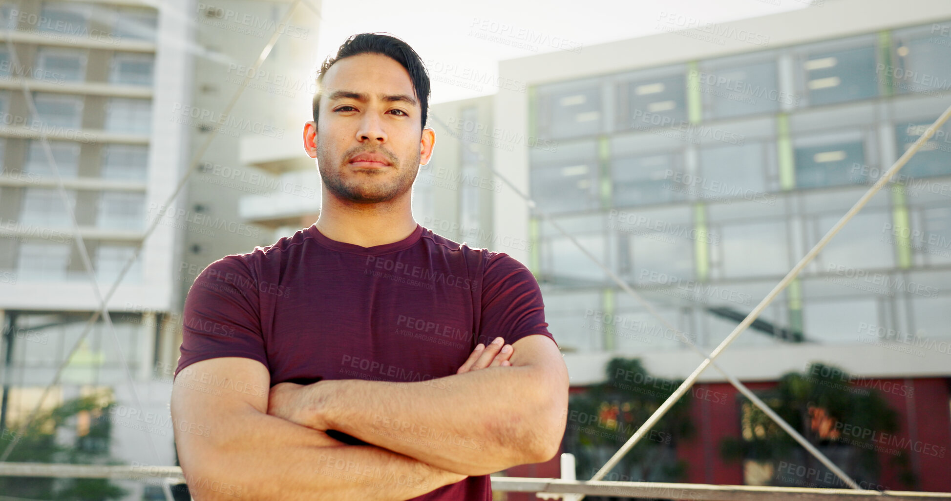 Buy stock photo Portrait, fitness and man in city, arms crossed and urban town with buildings, sports and exercise. Serious face, healthy athlete or person in street, training and wellness with workout and pride