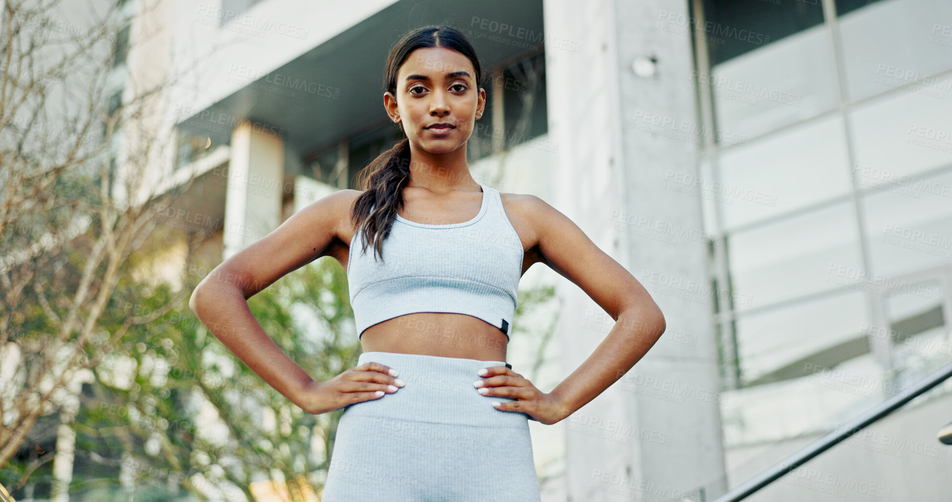 Buy stock photo Portrait, serious and woman in city, runner and urban town with buildings, training and exercise. Face, healthy athlete and person with confidence, pride and wellness with workout and sportswear