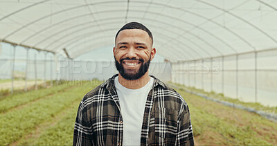Buy stock photo Smile, sustainable and portrait of man in greenhouse for agriculture, eco friendly or natural produce. Happy, environment and face of male farmer from Mexico for indoor gardening with vegetables.