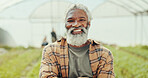 Happy, sustainable and portrait of man in greenhouse for agriculture, eco friendly or natural produce. Smile, environment and face of mature African male farmer for indoor gardening with vegetables.