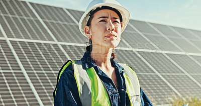 Buy stock photo Solar panels, thinking and countryside with woman, sustainability and clean energy. Person, outdoor and employee with hard hat, eco friendly or professional with inspection, choice or quality control