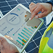 Person, hands and engineer with tablet screen for solar panel graph ...
