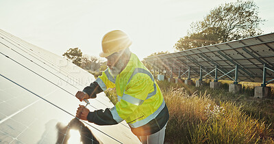 Buy stock photo Solar panels, install and grid with black man in nature for photovoltaic technician, renewable energy or power generator. Sustainability, electric system or engineer with person for maintenance