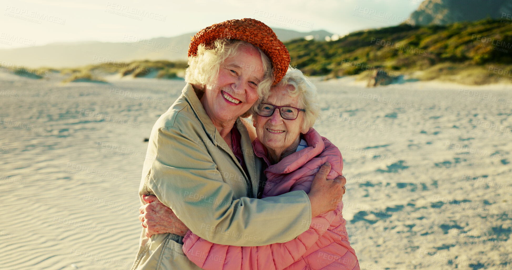 Buy stock photo Hug, friends and portrait with old women at beach for bonding, retirement and happiness. Summer vacation, travel trip and adventure with senior people in outdoors for carefree, paradise and health