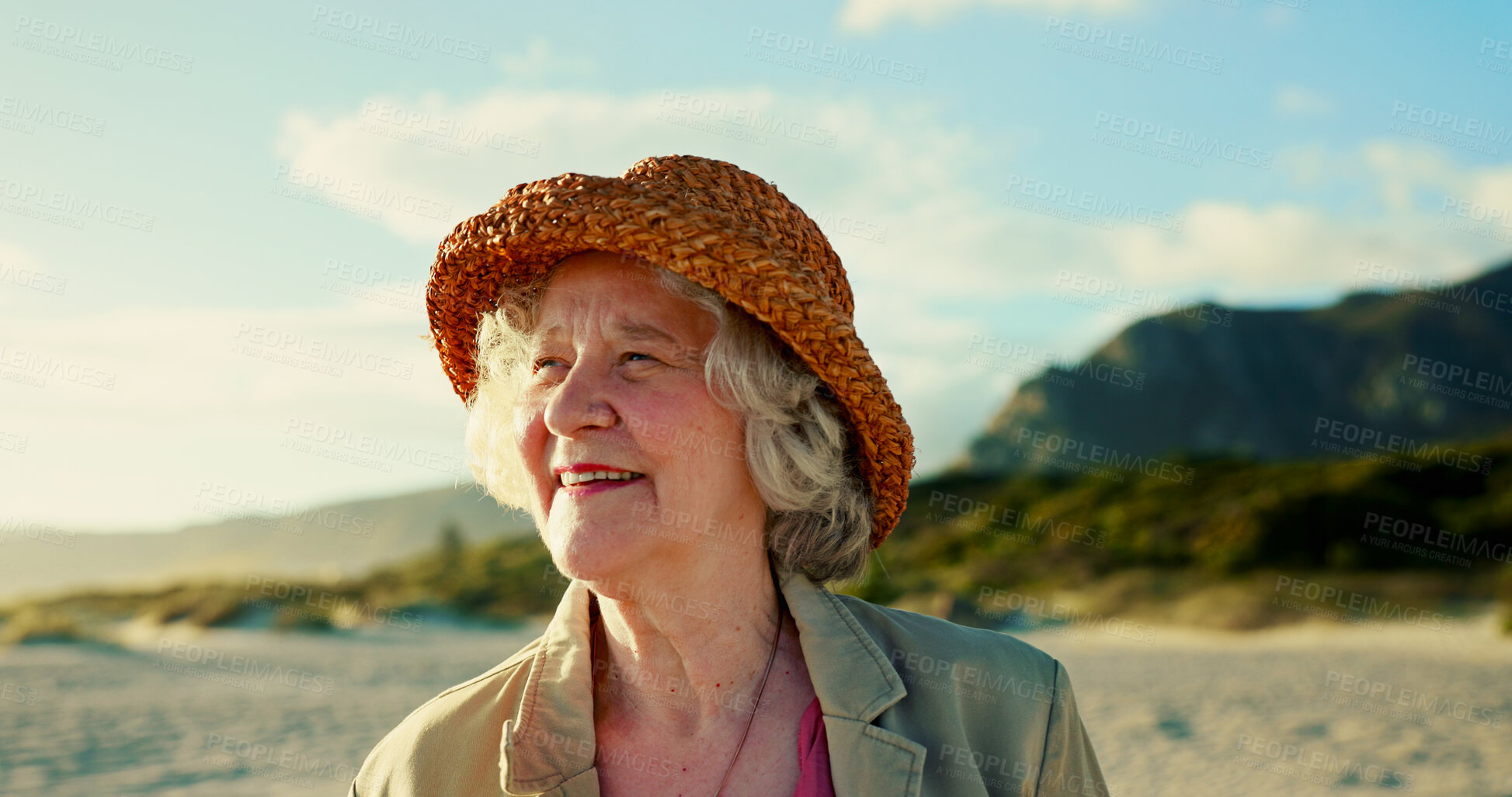 Buy stock photo Happy, beach and senior woman with smile for summer, travel and weekend in Australia. Fashion, sunrise and face of mature person by sea for adventure, fresh air and relax in retirement outdoors