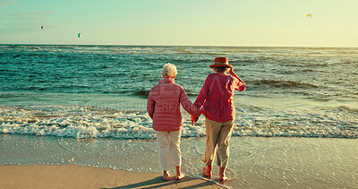 Buy stock photo Holding hands, friends and waves with old women at beach for bonding, retirement and happiness. Summer vacation, travel trip and adventure with back of senior people for carefree, paradise and health