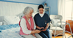 Senior woman, caregiver and relax with tablet in bedroom for medical report, wellness news and healthcare. Elderly person, volunteer and digital for explain, insurance update and information at house