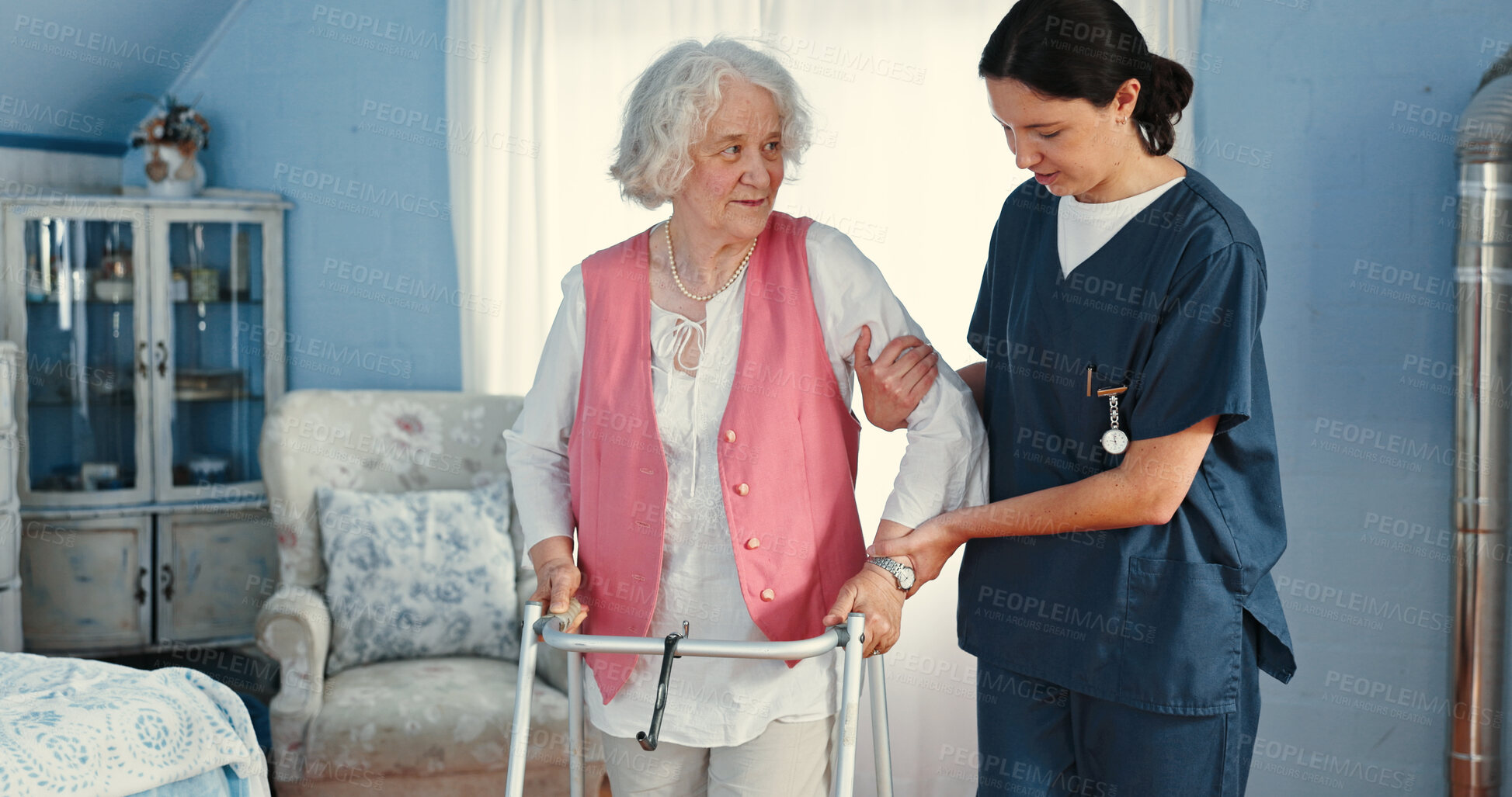 Buy stock photo Caregiver, helping and walker with old woman with a disability for healthcare, nurse and empathy. Retirement, gratitude and elderly care with people in nursing home for support, volunteer and patient