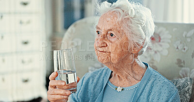 Buy stock photo Thinking, senior woman and water at retirement home for past life, nostalgia and remember with memory. Sad, elderly person and drink with reflection, loneliness and hope with peace of future wellness