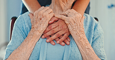 Buy stock photo Holding hands, kindness and hug with old person in living room for healthcare, caregiver or empathy. Retirement, gratitude and care with closeup of people in nursing home for trust and patient