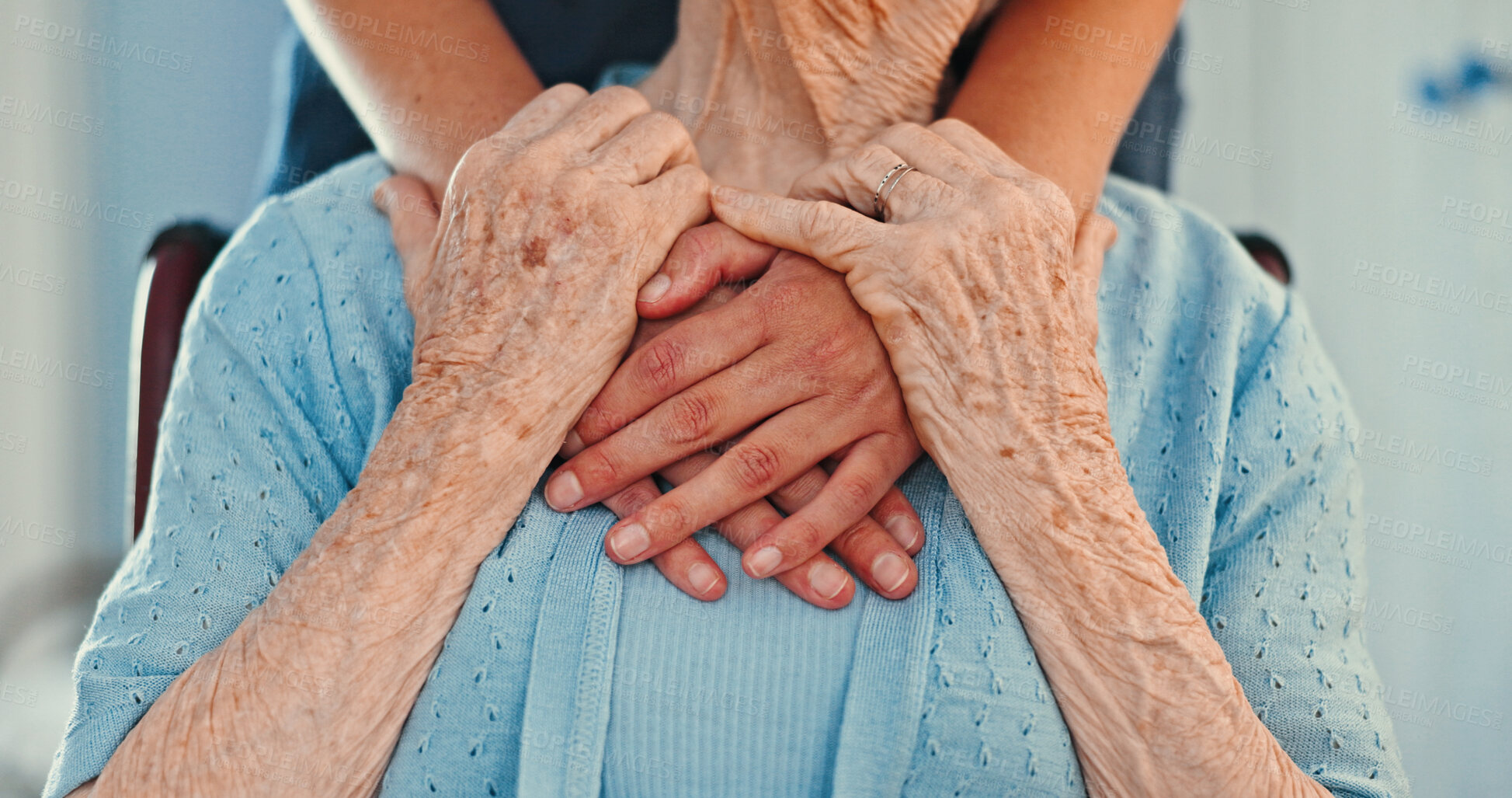 Buy stock photo Holding hands, kindness and hug with old person in living room for healthcare, caregiver or empathy. Retirement, gratitude and care with closeup of people in nursing home for trust and patient