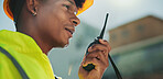 Radio, construction and man in city for communication, contact and maintenance. Civil engineering, architecture and worker talking for planning, building infrastructure and property renovation