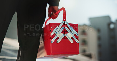 Buy stock photo Hands, toolbox and repair with person on roof for solar panel maintenance, check or inspection in city. Engineer, technician and outdoor with gear for renewable energy with sustainability in Colombia