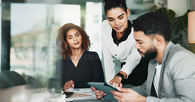 Buy stock photo Pointing, project management and tablet with business people in office for graphic design discussion. Meeting, web development and question with employee team in workplace for planning or strategy