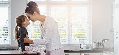 Buy stock photo Happy mother, child and touch nose in home for love, care or family connection with parent in kitchen. Smile, girl and mom embrace kid for support, bonding and together with daughter for relationship